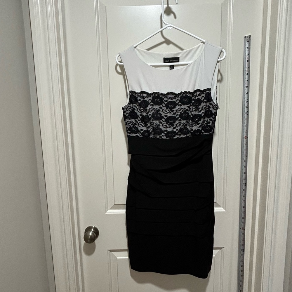 Dress Barn Connected -  size 8 midi Black and White Midi Dress.  Lace overlay